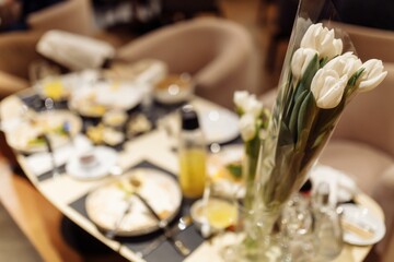 Picture of fresh tulip flowers in beautiful vase, happy mothers day, festive still life, love concept