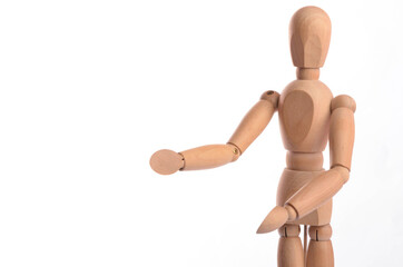 Wooden figure mannequin posing in action isolated on white background.