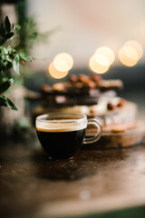 espresso and chocolate bars on a Board with nuts