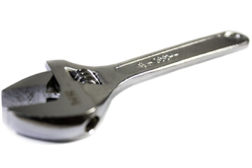 Adjustable wrench on a white background.