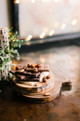 chocolate bars on a Board with nuts