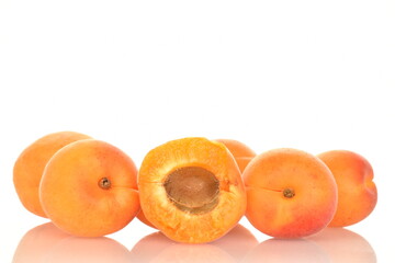 Ripe sweet, organic apricots, close-up, on a white background.