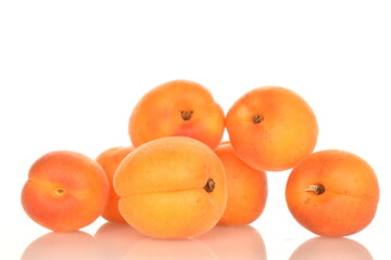 Ripe sweet, organic apricots, close-up, on a white background.