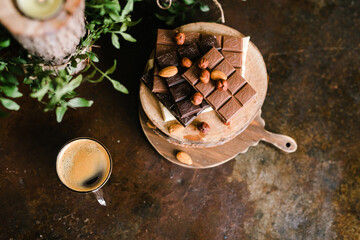 chocolate bars on a Board with nuts