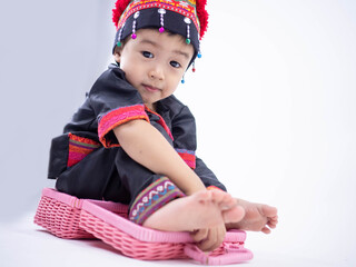 Hmong children little boy wearing traditional dress on white background