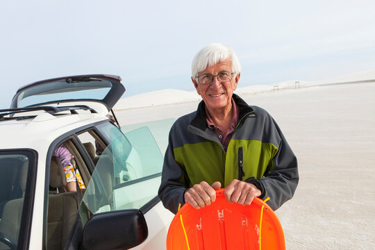 senior man looking at map, White Sands Nat'l Monument, NM