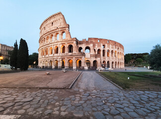 Fototapeta na wymiar Coliseum in Rome without people at the sunset