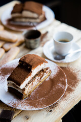 Tiramisu. Traditional italian dessert on wooden background. coffee break