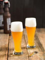 glass of beer on wooden table
