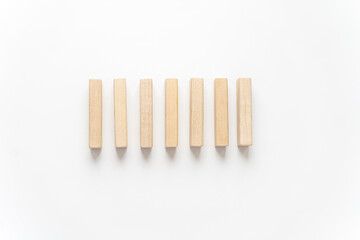 wooden bars lie on a light background