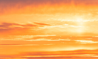 Amazing sky during golden sunset, bright orange sky with sunlight 