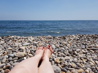 feet on the beach