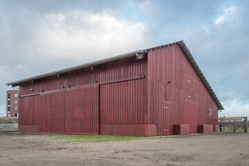 big bright red wooden barn