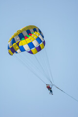 Parasailing in the blue sky of Cox's Bazar
