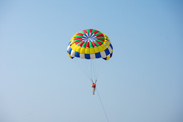 Parasailing in the blue sky of Cox's Bazar