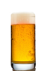 Glass of beer with foam and carboni dioxide in back lit