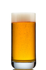 Golden beer with foam in a translucent glass
