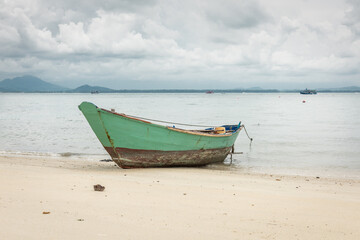 Naklejka na ściany i meble fisher's boat at the beach of the island Koh Samet in Thailand