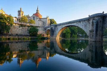 Fototapeta premium Amarante church view with Sao Goncalo bridge at sunset, in Portugal