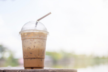 Smooth Focus and soft Focus,The iced coffee cups that were placed on the tables in the office were served from the coffee shops that are not far apart to serve customers. Coffee shop service concept