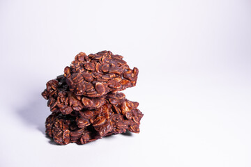 Oatmeal cookies with chocolate isolated on white background. Healthy snack. Close up view.