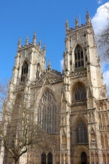 Fototapeta na wymiar A sunny, spring afternoon view of the facade of stunning York Minster, York, UK