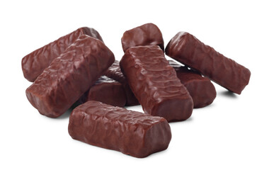 Pile of chocolate candies isolated on white background, small depth of focus.