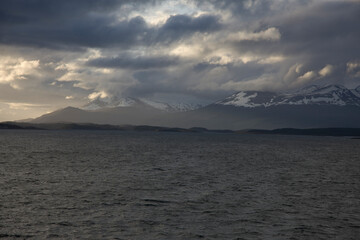 Antarctica landscape with ice and icebergs at sunset on a winter day