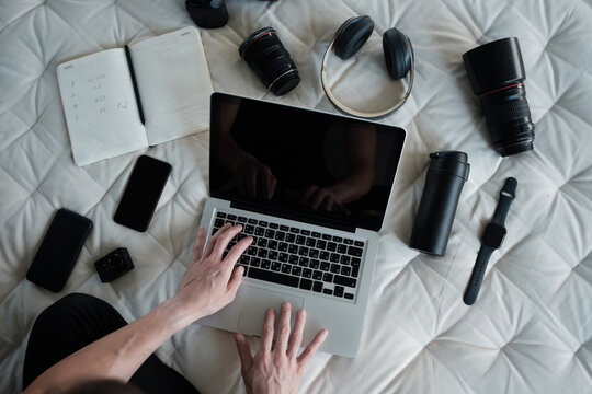 top view of creative photographer using graphic tablet on work table.