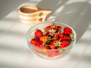 Still life of fresh strawberries tea and lavender