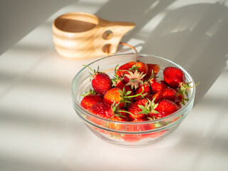 Still life of fresh strawberries tea and lavender
