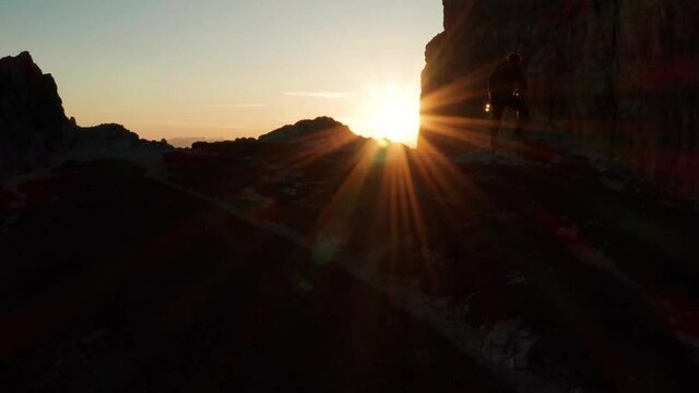 sunset light over the alps whiti silhouette of a men