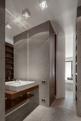 Stylish bathroom with concrete tiles