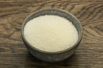 White sugar in the bowl