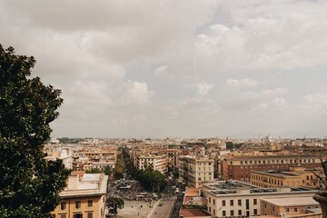 Fototapeta na wymiar City of Rome seen through the top of the hill