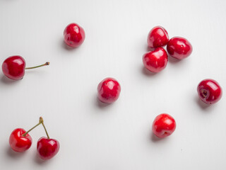 Fototapeta na wymiar Sweet red cherries on white