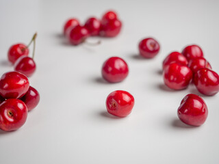 Sweet red cherries on white