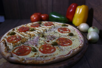 pizza with tomatoes and olives