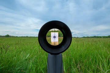 Sniper gun scope view, target 