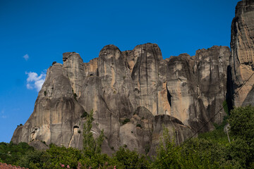 Fototapeta na wymiar A unique geological phenomenon of the landscape with huge vertical cliffs, on top of which are Orthodox monasteries .. The wonder of nature. horizontal