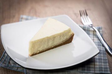 delicious slice of cheesecake on a plate