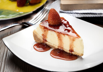 delicious slice of cheesecake on a plate