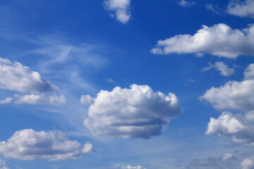 Naklejka na ściany i meble Spring blue sky with clouds