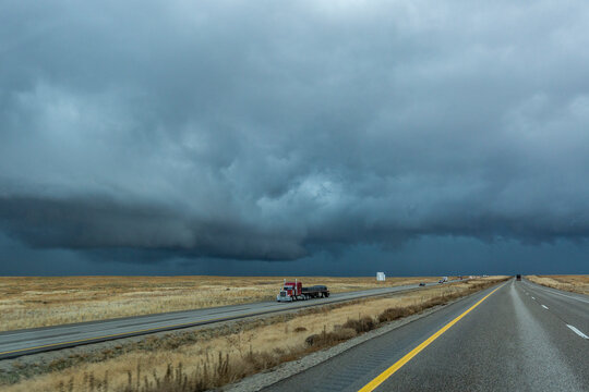 Truck on highway under overcast sky