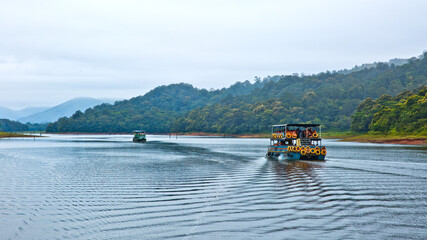 Thekkady, Kerala/India - September 24, 2013: Tourists on board Kerala Tourism Development...