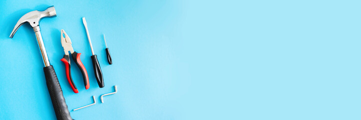 Repair tools on a blue background. Banner.