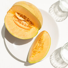 Muskmelon fruit on white background