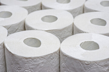 Rolls of toilet paper. Lots of toilet paper rolls.  Soft hygienic paper