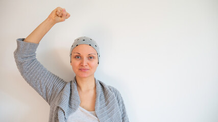 Portrait of female cancer survivor no white background. Happy cancer survivor after successful...