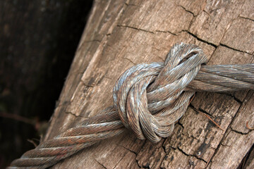 old rope on wood log with lots of texture